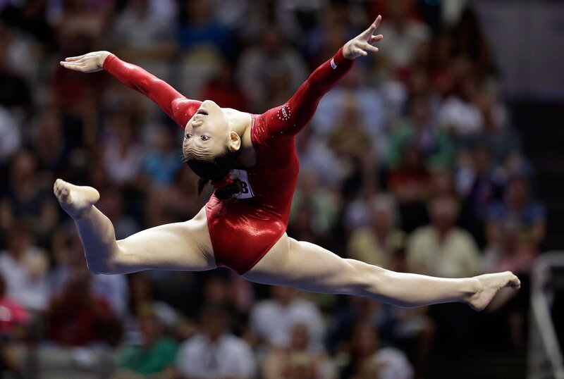 gymnast in red leotard