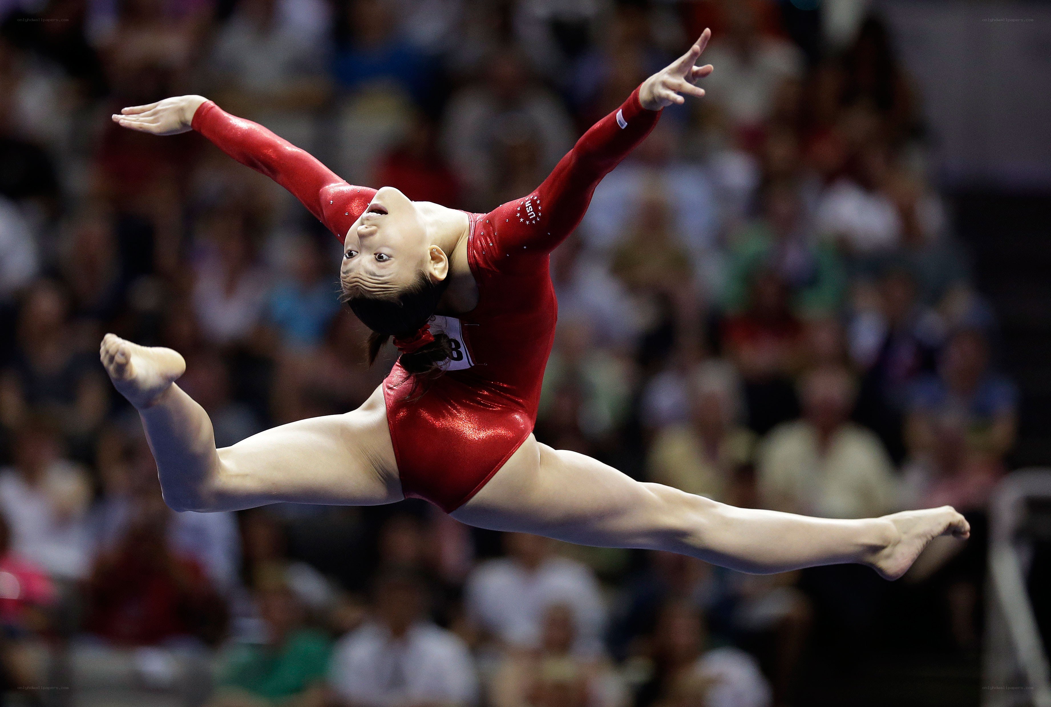 gymnast in red leotard