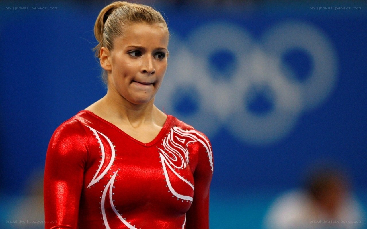 gymnast in red leotard