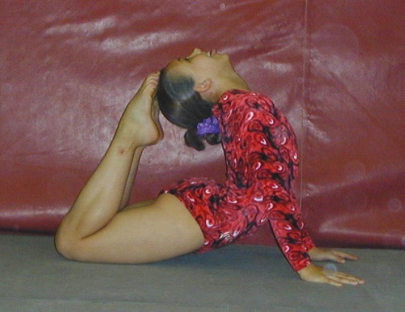 Gymnast in Red Leotard — Focused