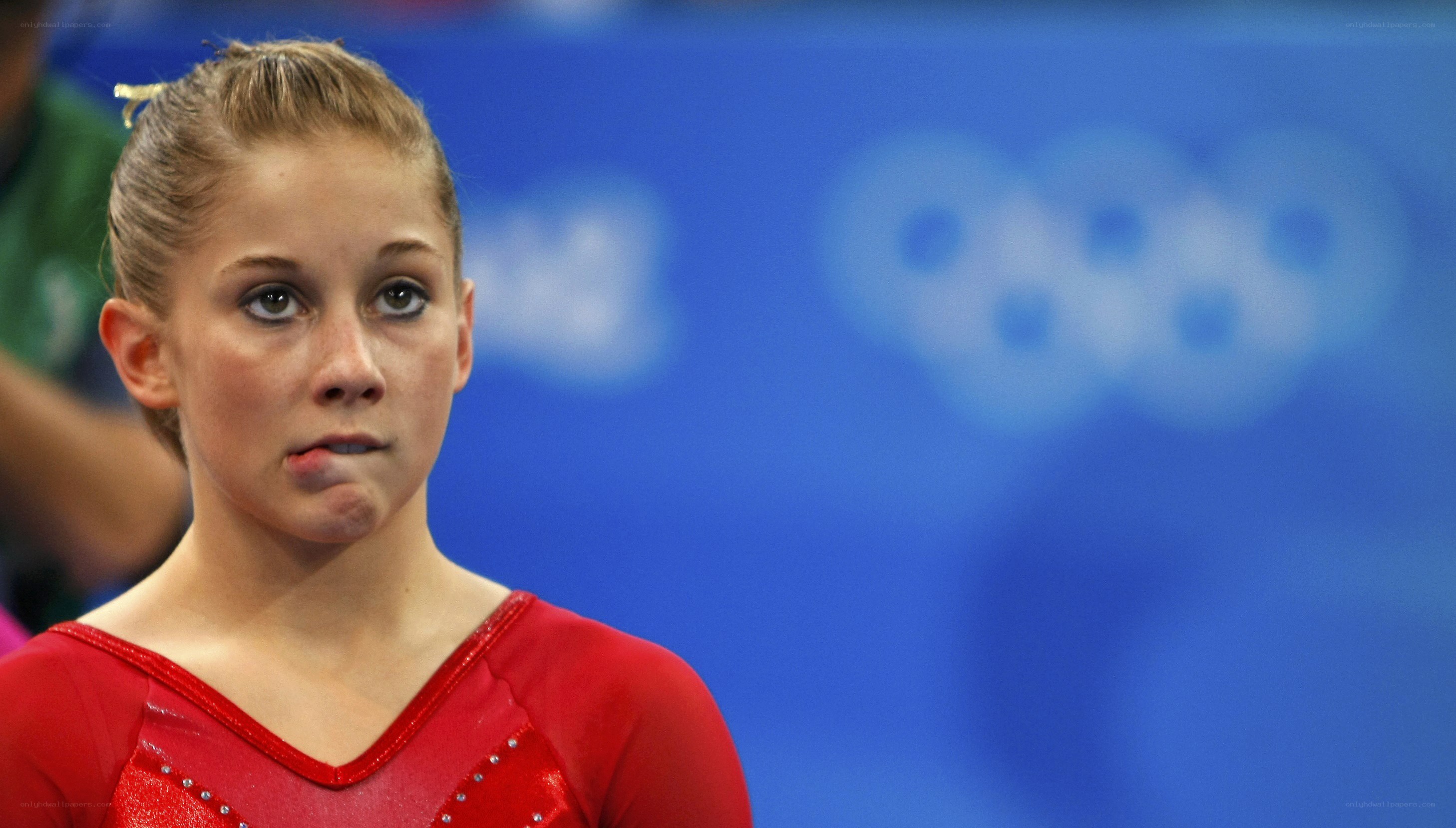 gymnast in red leotard