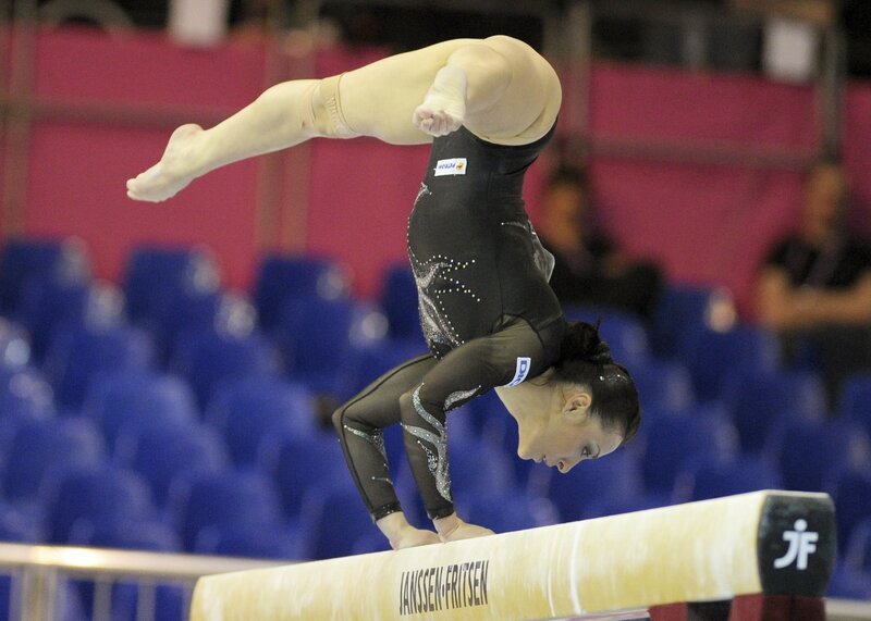 Gymnast on balance beam