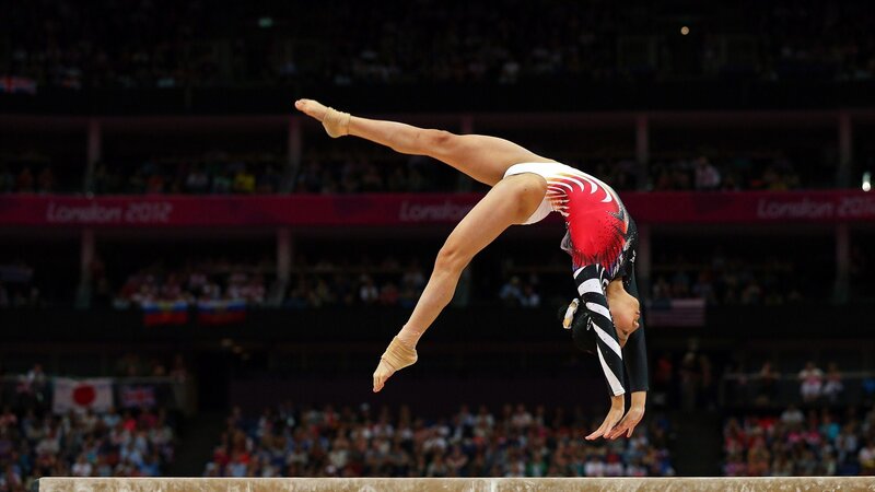 Gymnast on Balance Beam — Red