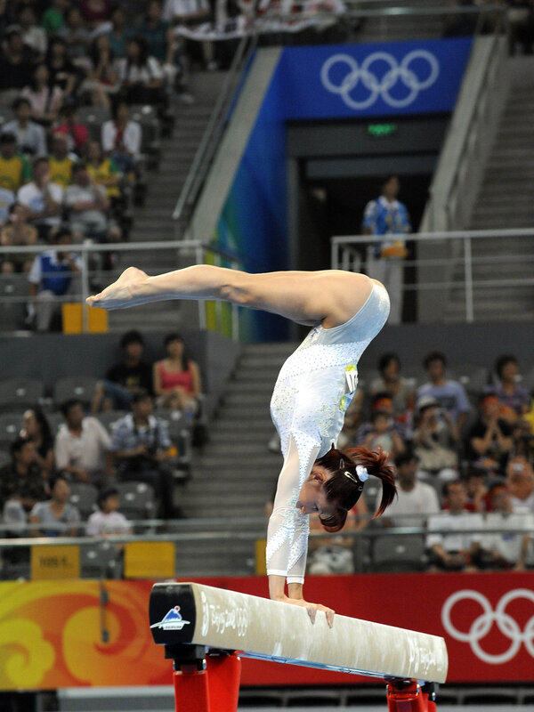 Gymnast on Balance Beam — White