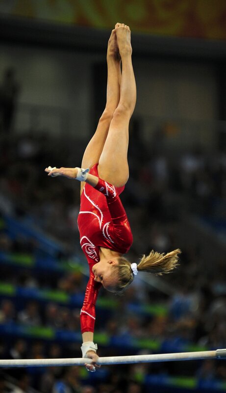 Gymnast on high bar