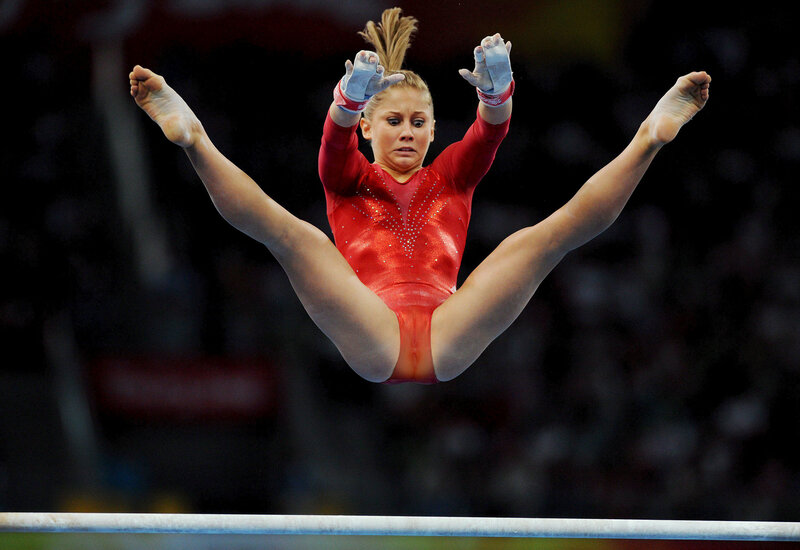 gymnast on uneven bars