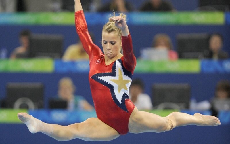 gymnast performing split