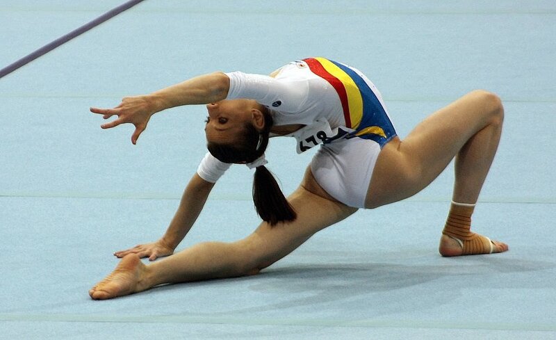 Gymnast Performing Split — Blue