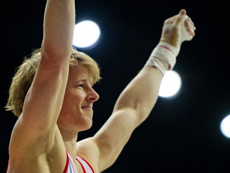 Gymnast with Arms Raised