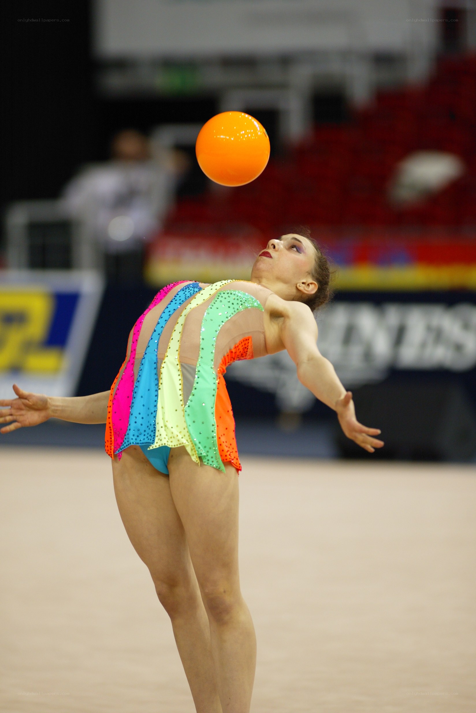Gymnast with orange ball