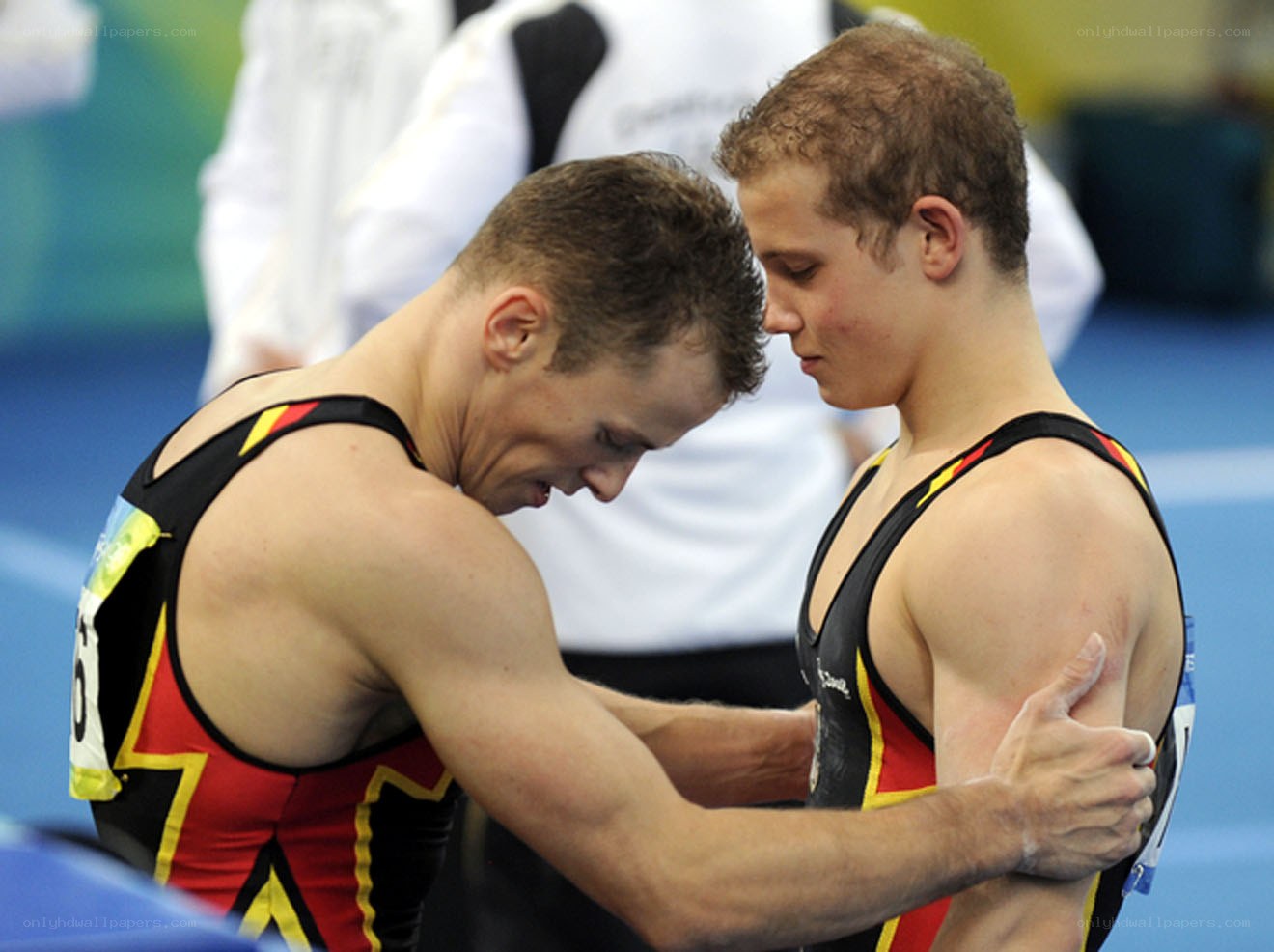 Gymnasts in embrace