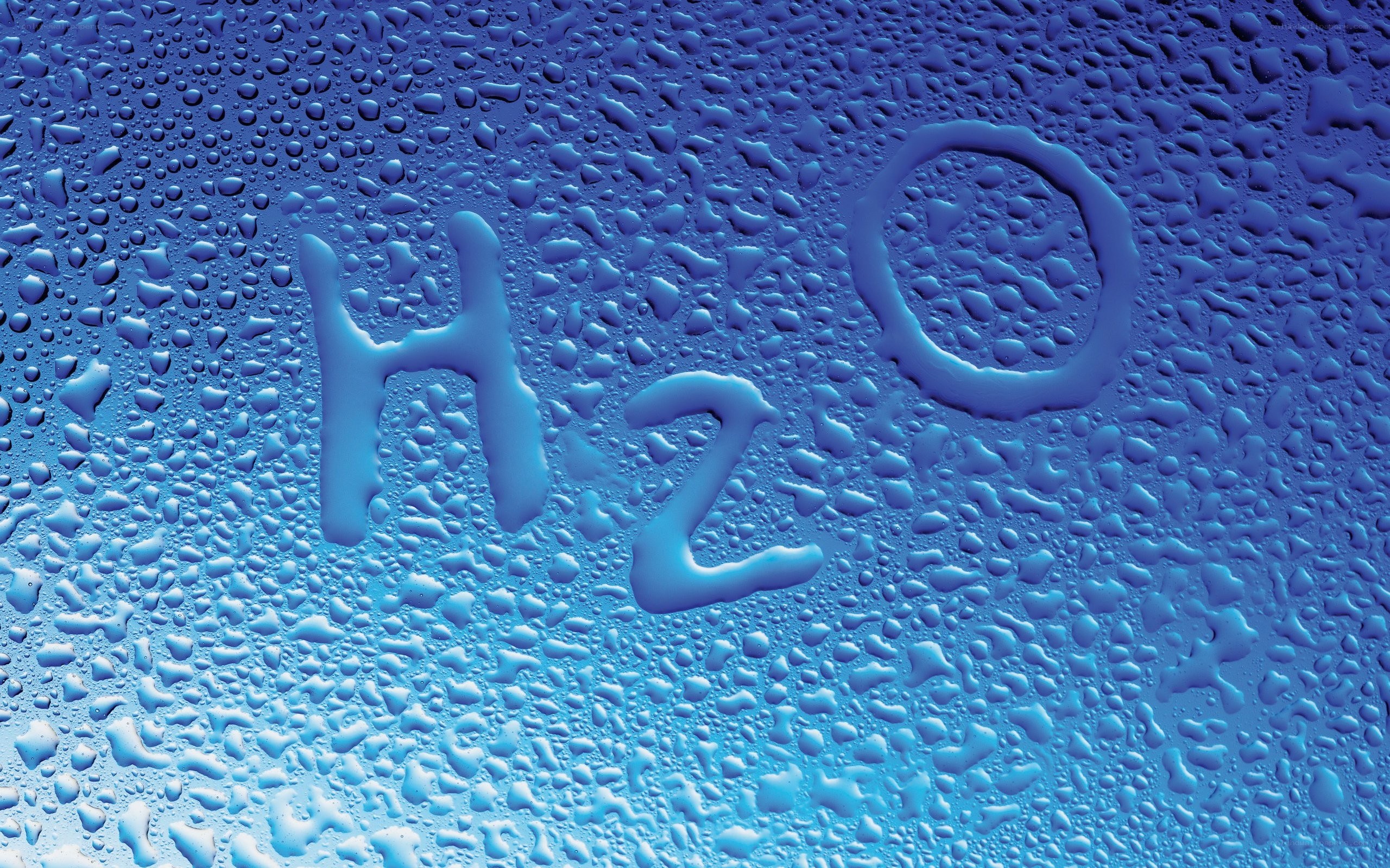 H2O written on a wet surface