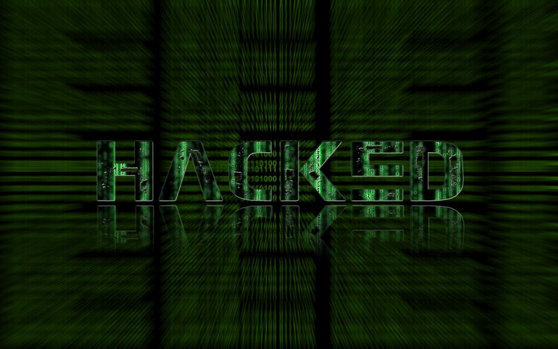hacked text on green background