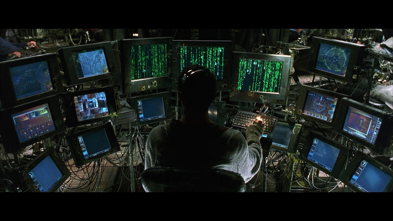 hacker at computer station