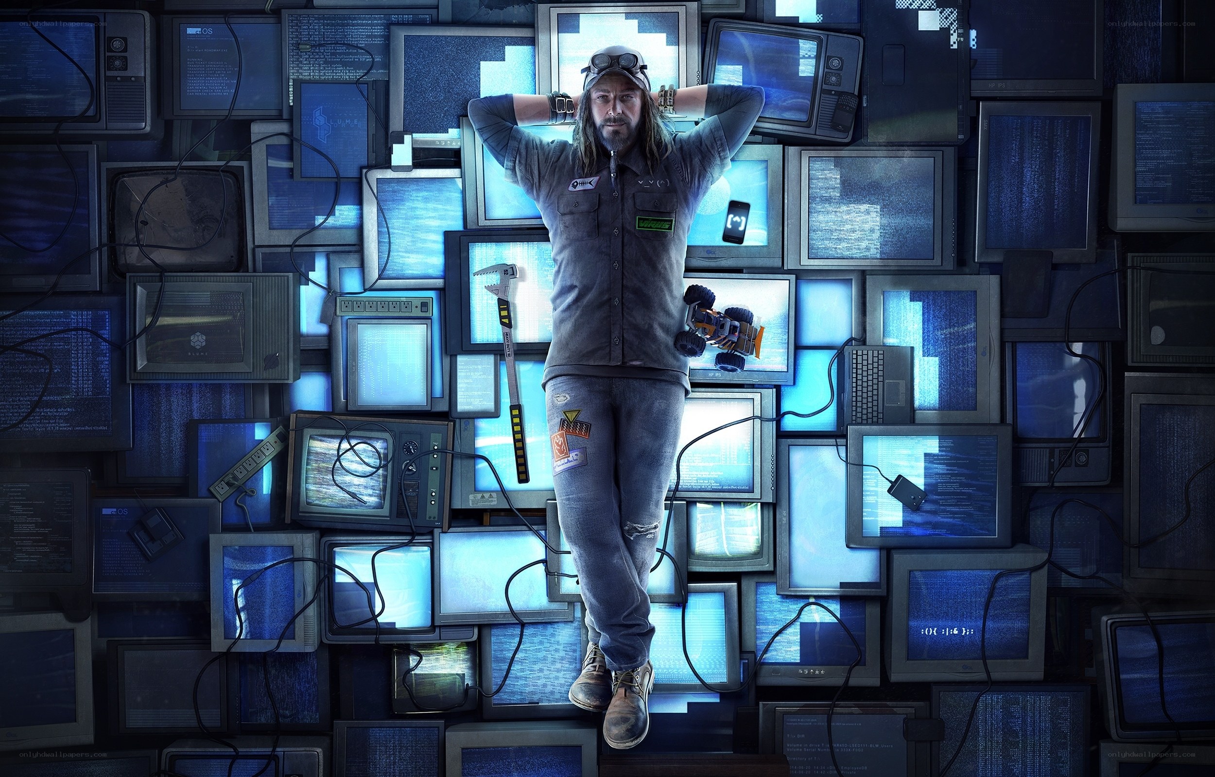 hacker surrounded by monitors