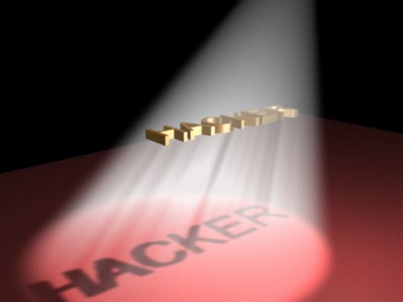 Hacker text under spotlight