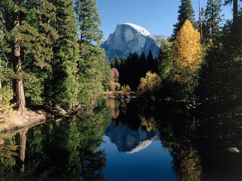 Half Dome reflected in a river
