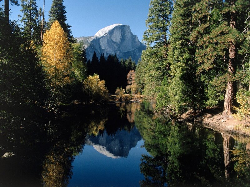 Half Dome reflection in a calm river