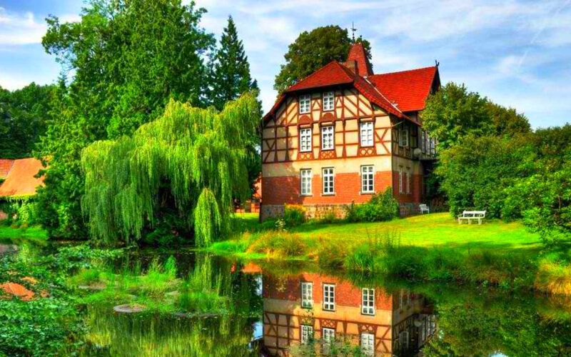 Half-timbered House by Pond