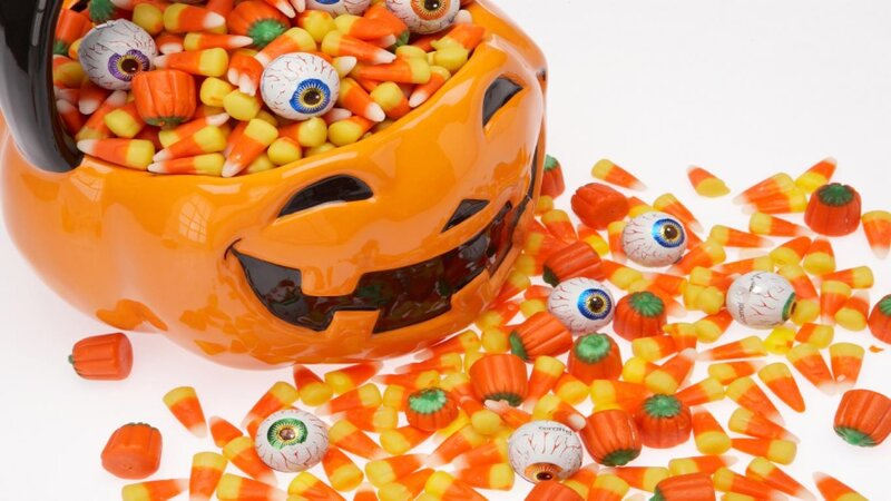 Halloween candy in a jack-o-lantern bucket