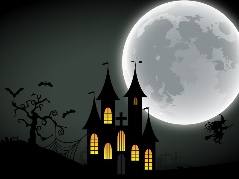 Halloween castle under full moon