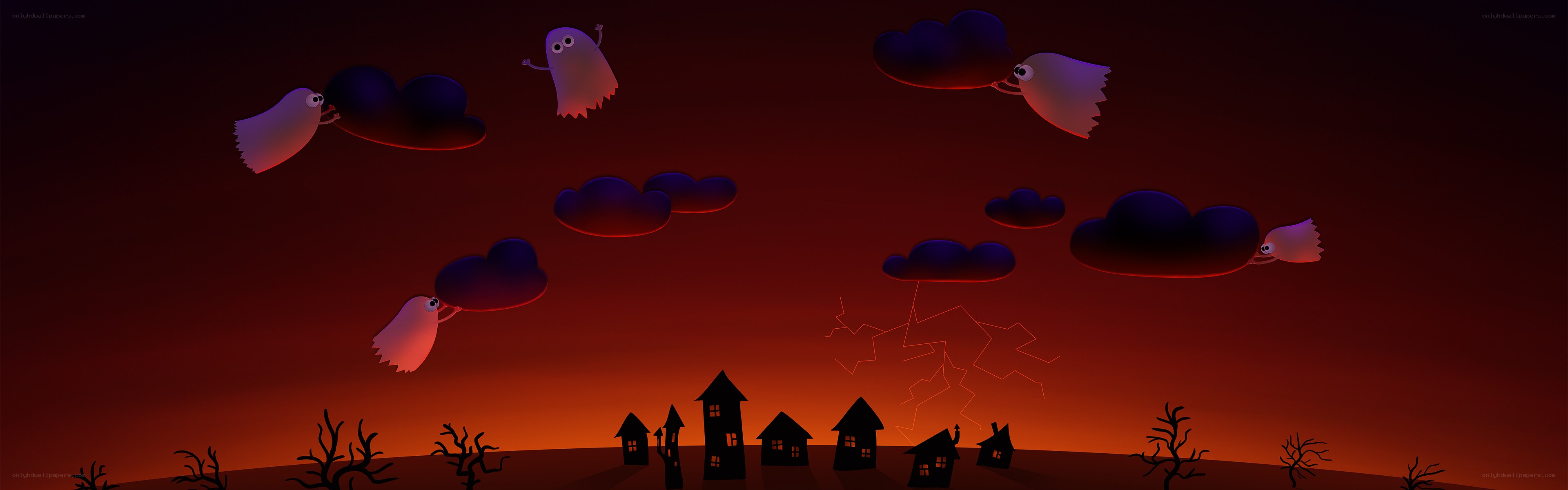 Halloween ghosts in stormy sky