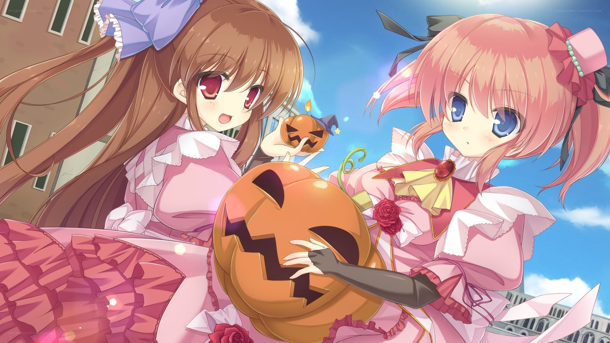 Halloween girls with pumpkins