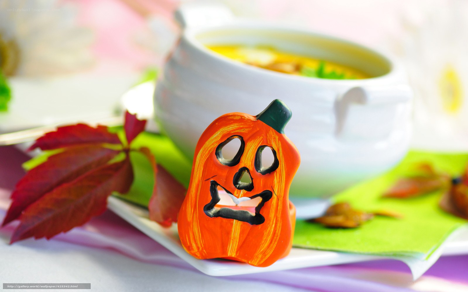Halloween soup with pumpkin decoration