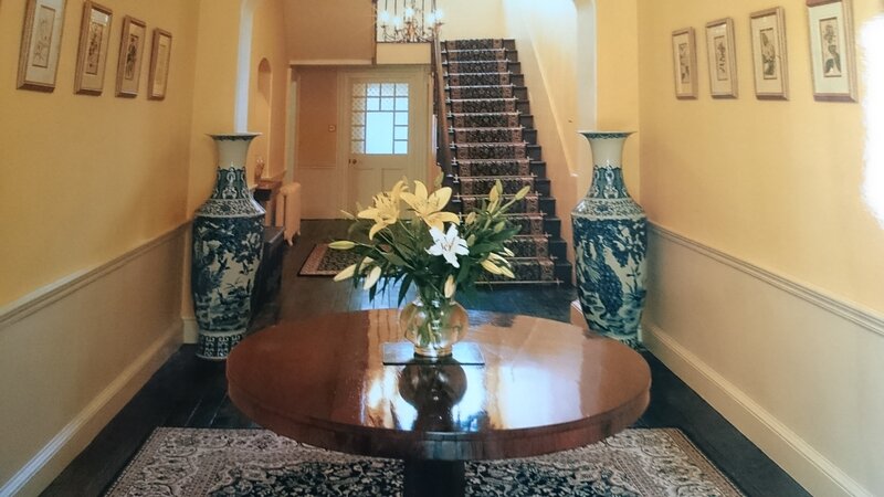 Hallway with Vases and Flowers