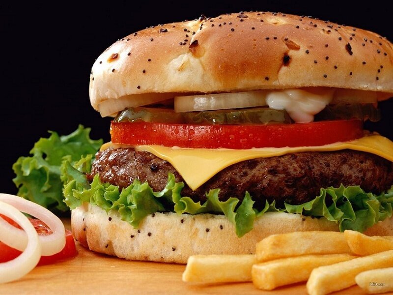 hamburger with fries and toppings