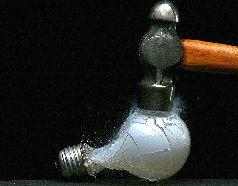 Hammer breaking light bulb