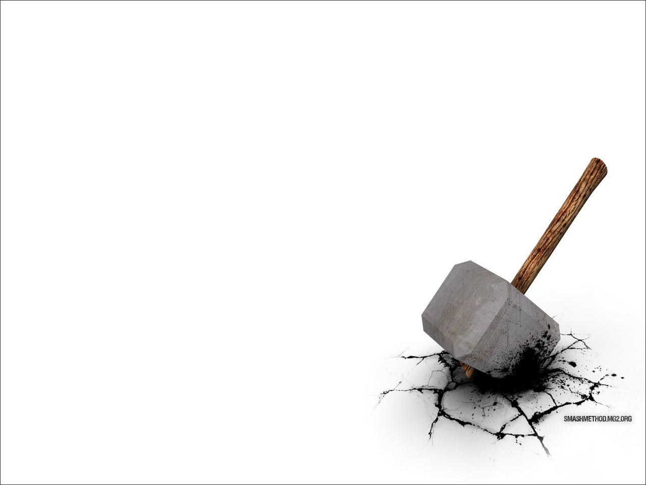 hammer breaking through surface