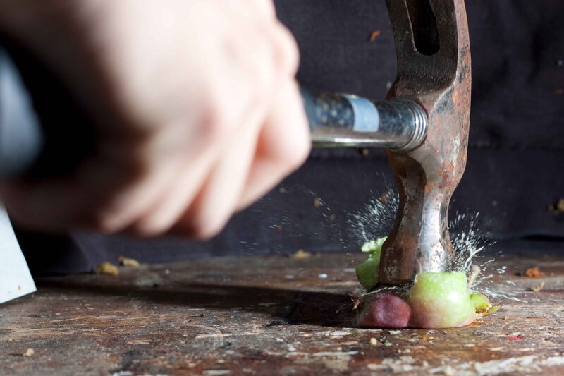 Hammer crushing fruit