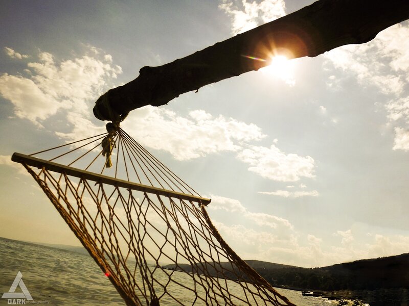 hammock by the sea at sunset