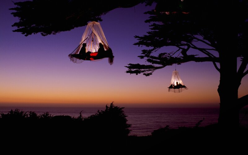 Hammocks at sunset by the sea