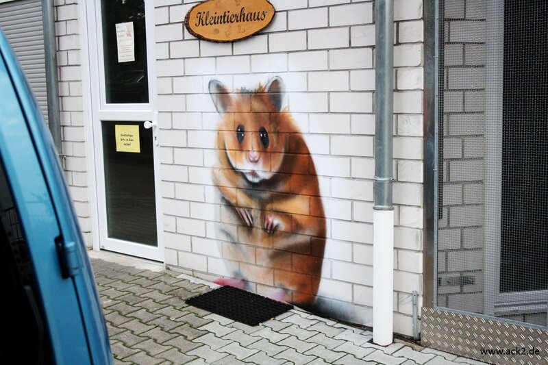 Hamster mural on building wall
