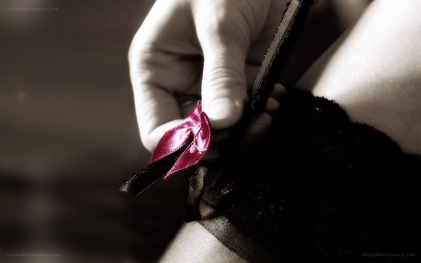 hand adjusting lingerie strap
