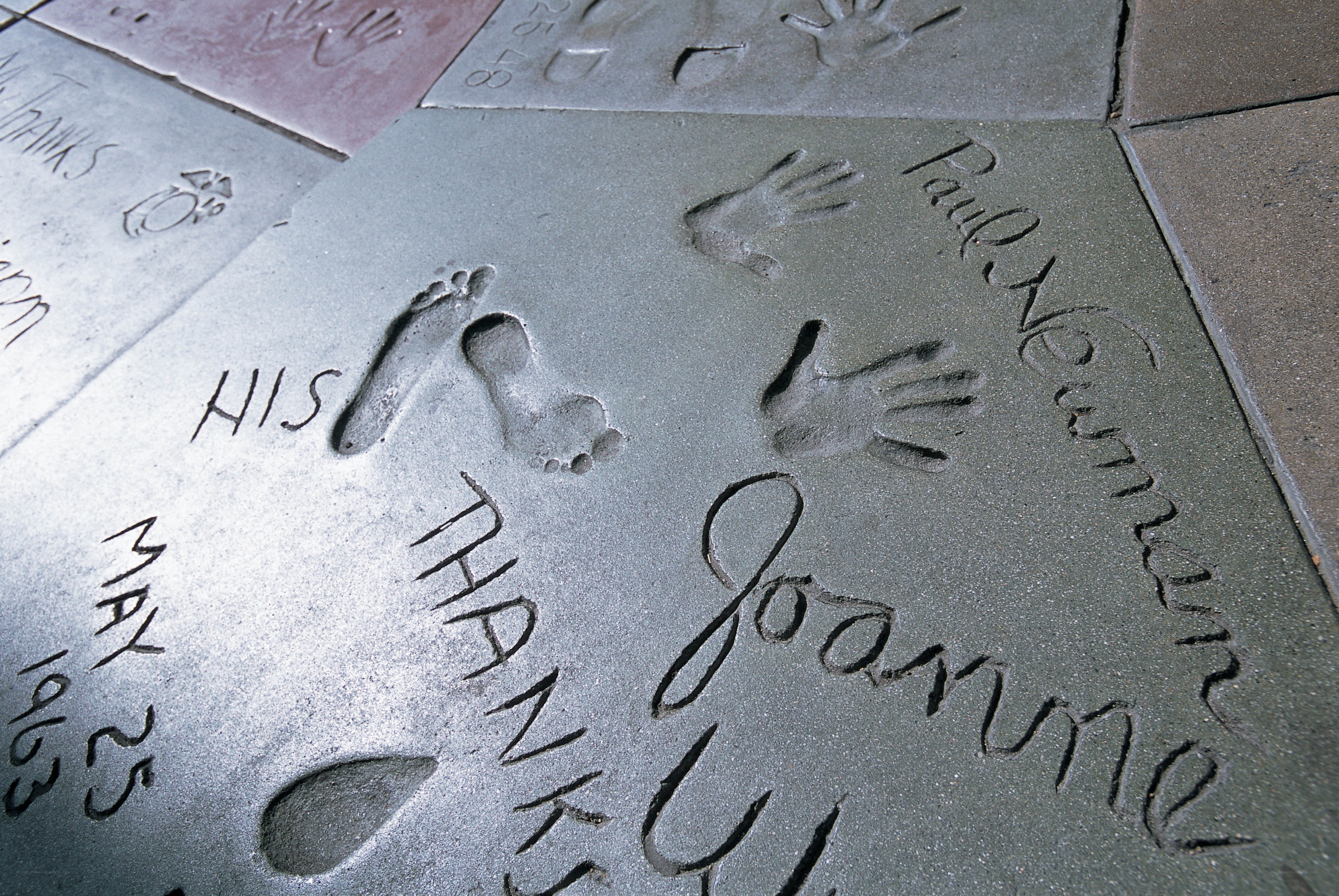 hand and footprints on concrete