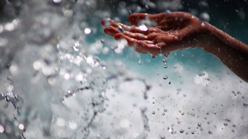 Hand Catching Water — Blue