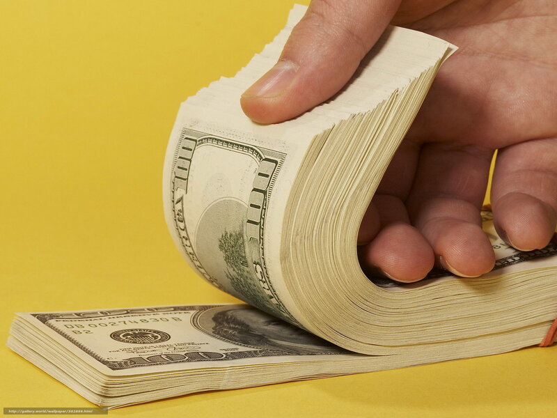 hand counting hundred dollar bills