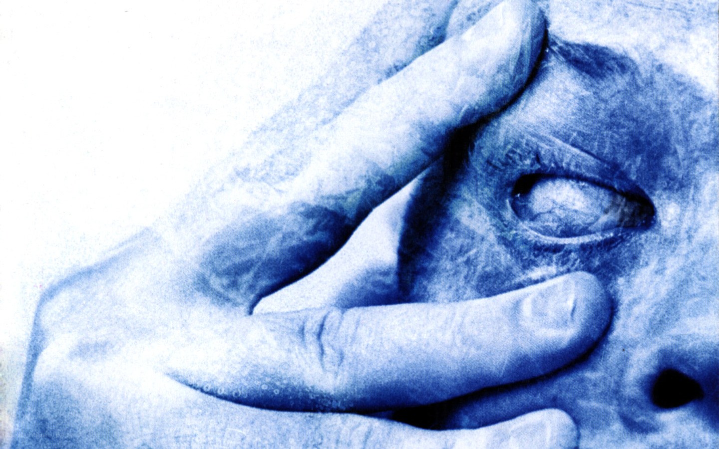 Hand covering eye