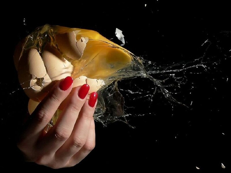 Hand Cracking Egg — Black