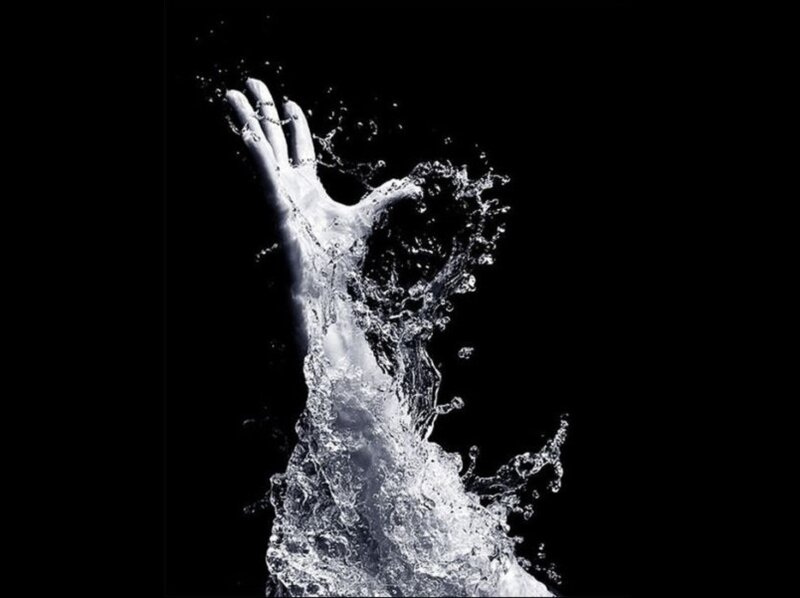 Hand Emerging from Water — Black