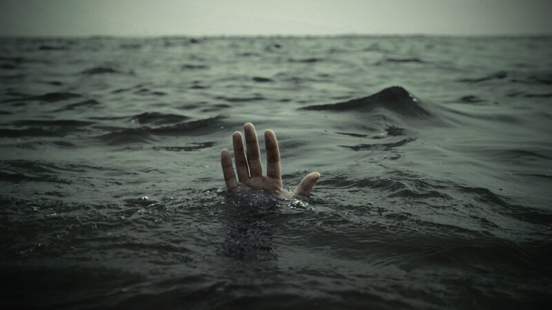 Hand Emerging from Water — Gray, Dramatic