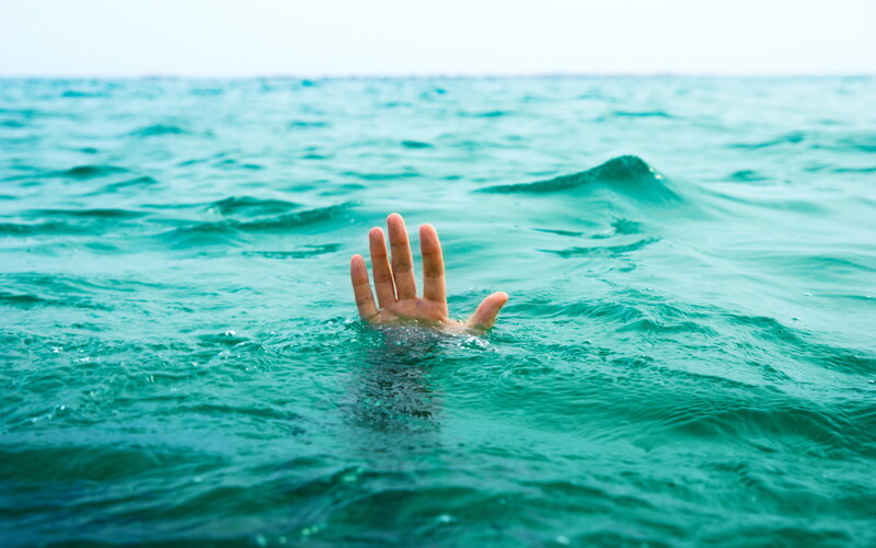 Hand Emerging from Water — Teal