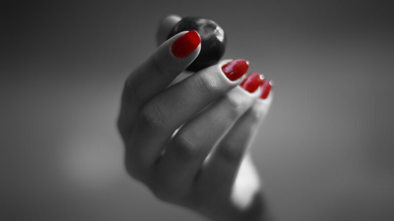 Hand Holding a Berry