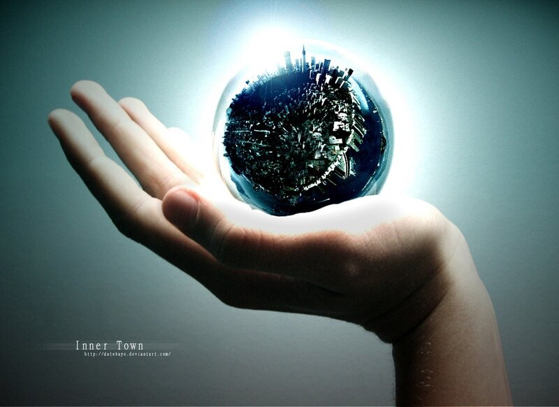 hand holding a city globe