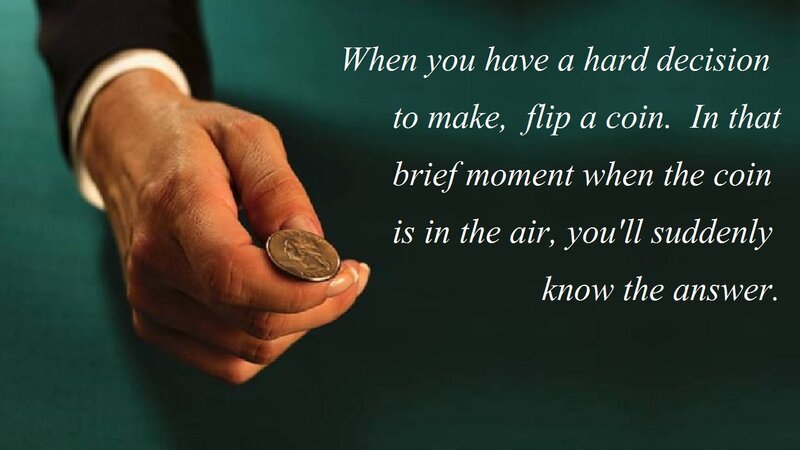 Hand Holding a Coin