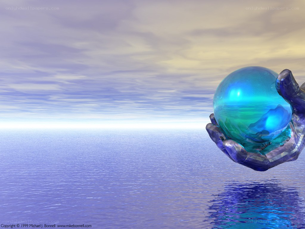 Hand holding a crystal ball