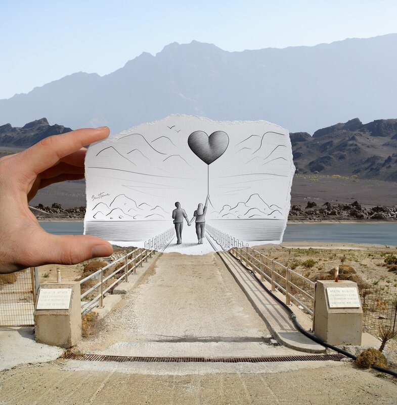 hand holding a drawing of a couple